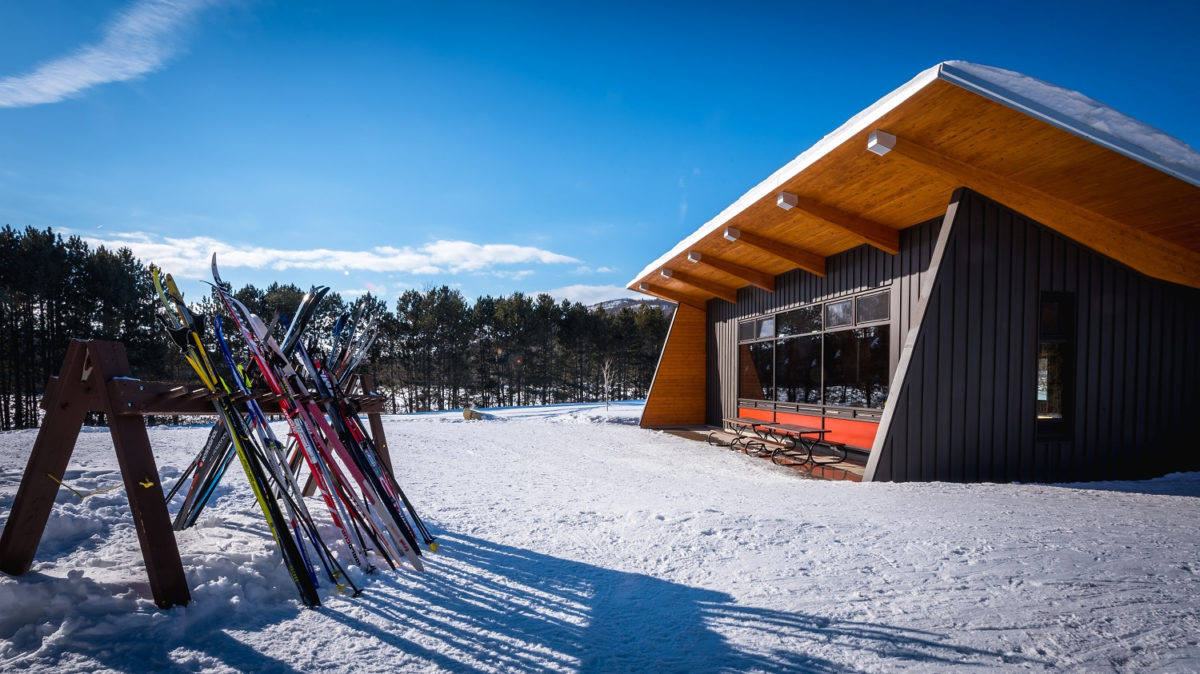 Renaud Shelter with an equipment rack in the foreground.
